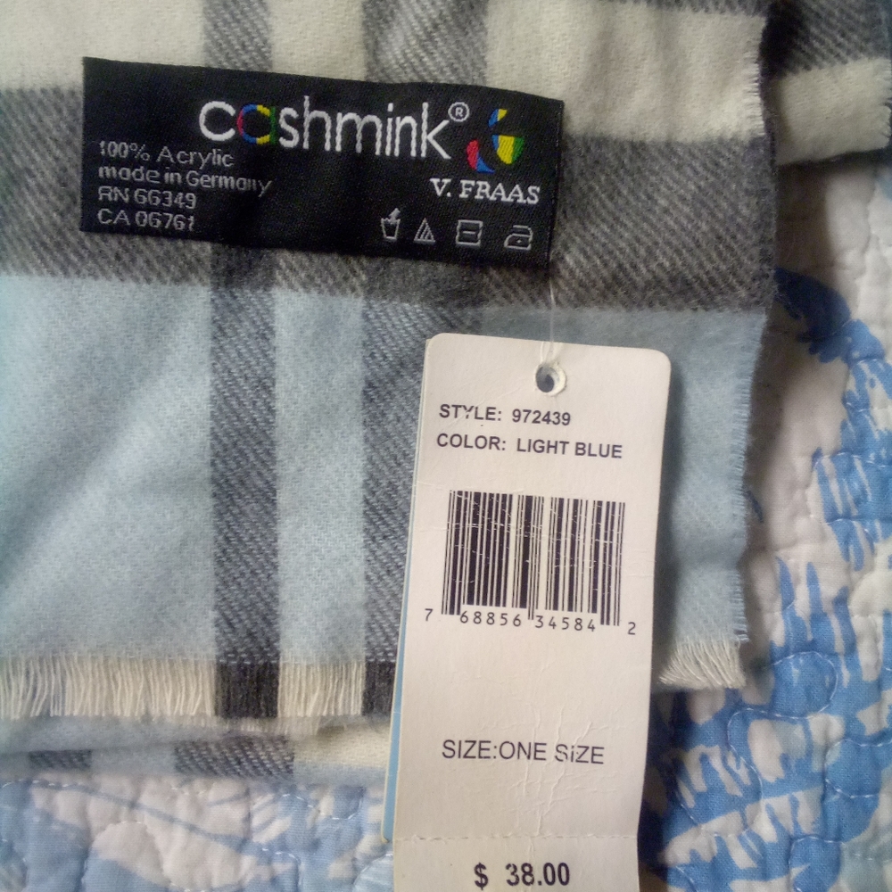A cashmink scraf one size fits all , blue grey and white in color